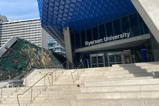 The Ryerson University Sheldon & Tracy Levy Student Learning Center showing the front sign and the steps leading up to the front door.